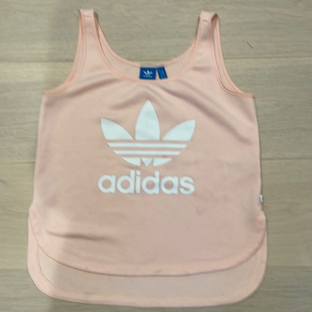 Size Small Adidas top. Worn 1-2 times. Great condition.